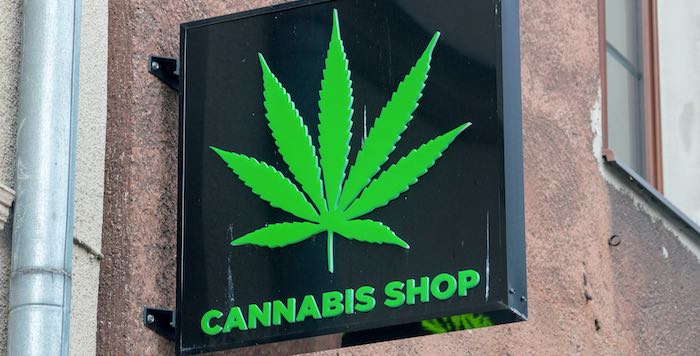 Photo of a retail sign stating "Cannabis Shop"