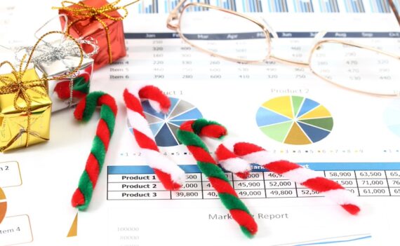Illustration of bar graphs with Christmas items on top