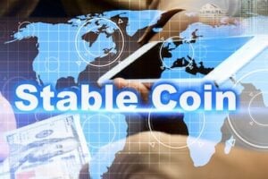 Illustration of a flat world map with the words "stable coin" next to dollar bills.